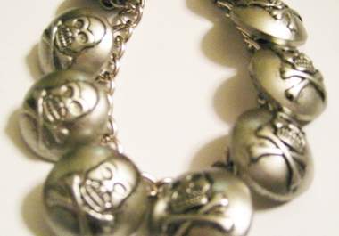 send you one skull and crossbones button bracelet big2
