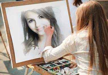 make your any photo appear as a girl is painting it with water colors in a street big3