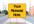 create a picture for you of a Center Lane Sign with a message of your choice placed on the sign