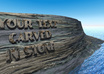 carve your name, slogan or message out in a stone wall