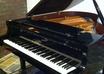sing and play a personalised happy birthday song in an Aussie accent on a genuine grand piano small1