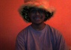 positively promote something while wearing a fuzzy hat
