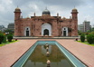 hold a sign promoting your message or name in front of Historical pattens of Lalbagh Fort is an incomplete 17th century in Dhaka,Bangladesh