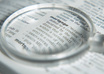 Definition-of-mortgage-with-magnifying-glass-uid-1341527