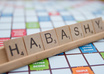 take a professional photo of a name or phrase spelled in Scrabble tiles