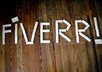 write what you want in big Jenga blocks with a wooden floor as backround