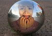 make it appear you are traped inside a shiny silver sphere small1