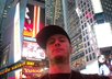 take a pic in the middle of Times Square NYC holding a personalized card or sign