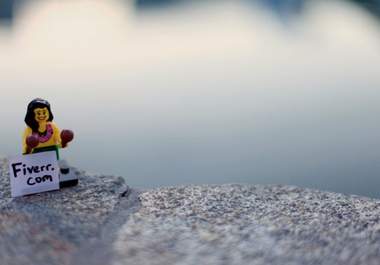 take a photo of a lego hula girl holding your website address, message, etc by a pool big1
