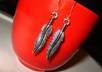 make a pair of boho chic feather earrings