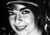 make a professional black and white portrait from a colored image