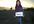 take a photograph holding a sign with your message