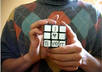 solve a rubik cube with your message on it small1