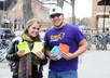 hand out 100 flyers in front of any busy store
