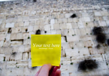 put your note between the bricks of The Kotel in Jerusalem big1