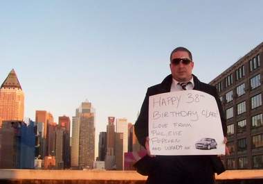 take a picture holding your message on a NYC rooftop big1