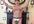 sing Happy birthday to you in Welsh, wearing only a thong and wooly hat