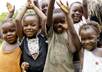 take professional 720p pictures of an African community, market place,animals or children playing in dirt and have them hold your name/message high on a cardbaord