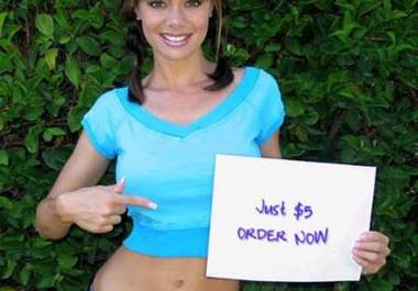 take AWESOME picture holding your sign big1